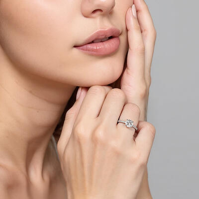 "Love Is Light" 1ct Round Cut Side Stone Engagement Ring