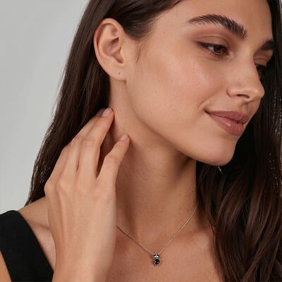 "Skeleton's Embrace" Heart Cut Skull Necklace