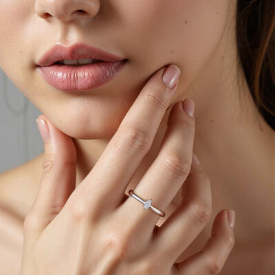 "Edge of Time" 0.3ct Marquise Cut Solitaire Engagement Ring