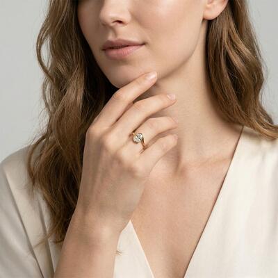 "My Cherished One" Oval Cut Sculptural Solitaire Engagement Ring