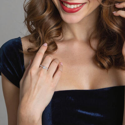 "Cheek to Cheek" 0.3ct Pear Cut Halo Engagement Ring