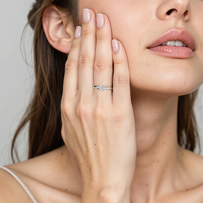 "Come Around Me" 0.3ct Oval Cut Side Stone Engagement Ring
