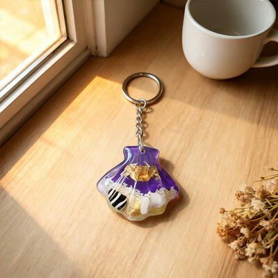 Enchanting Seashell Resin Keychain – Marine Theme with Crab, Sand, Conch & Shell