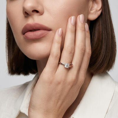 "Gentle Kiss" Round Cut Solitaire Engagement Ring