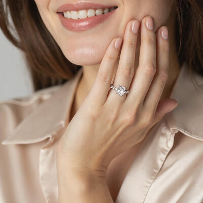 "Love Beyond Measure" Radiant Cut Side Stone Engagement Ring