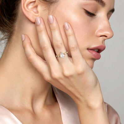 "Satellite of Love" Pear Cut Side Stone Engagement Ring