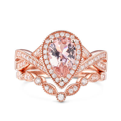 Jeulia Halo Pear Cut Synthetic Morganite Sterling Silver Ring Set