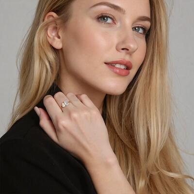 "An Ode to Affection" Emerald Cut Side Stone Engagement Ring