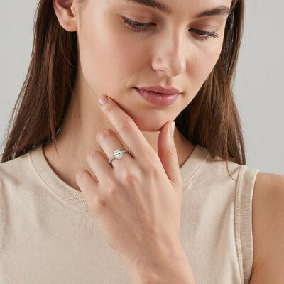 "The Love Note" Oval Cut Side Stone Engagement Ring
