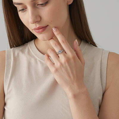 "How Sweet We Are" Round Cut Side Stone Engagement Ring