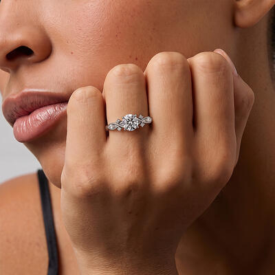 "Where Eternity Begins" Round Cut Side Stone Engagement Ring