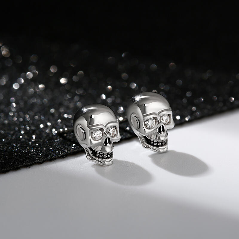 Jeulia Pendientes con diseño de calaveras de plata de ley