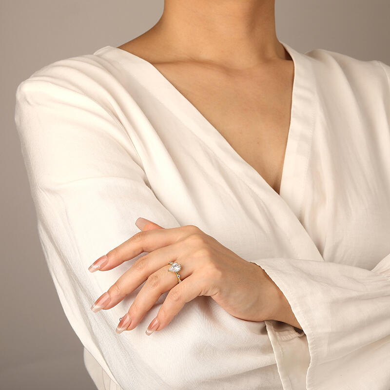 "Satellite Of Love" Pear Cut Side Stone Engagement Ring