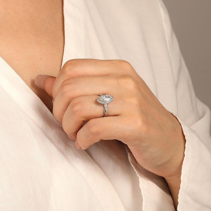 "Für immer vereint" Marquisenschliff Halo Verlobungsring