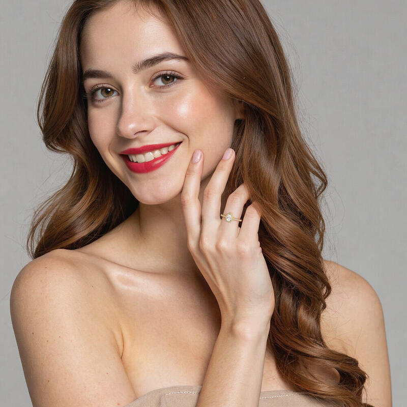 "Wange an Wange" Halo Verlobungsring 0,5 ct Birnenschliff