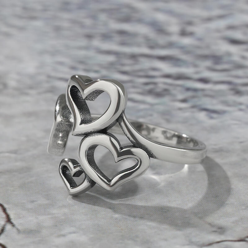 Jeulia Anillo abierto de plata de ley con cuatro corazones lindos