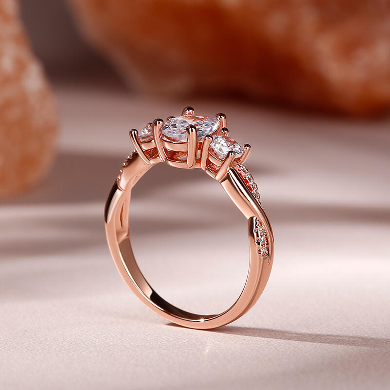 Jeulia 10K/14K/18K Gold Platinum Twist Three Stone Oval Cut Ring