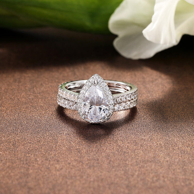 Jeulia Conjunto De Anillos De Eternidad De Plata Esterlina Con Talla Pirifoeme Con Halo