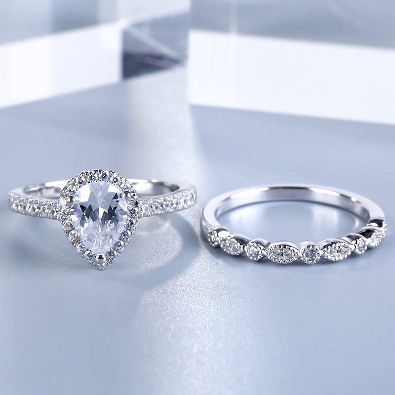 جوليا طقم خواتم هالة بقطع كمثرى من الفضة الإسترليني على شكل مسنن