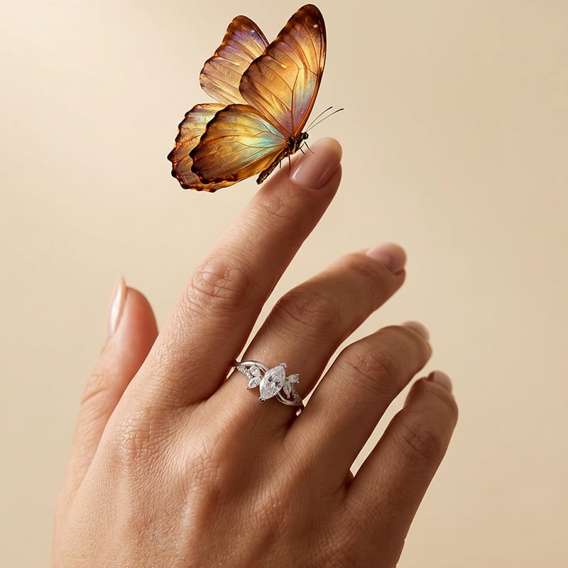 Butterfly Motif Marquise Cut Engagement Ring