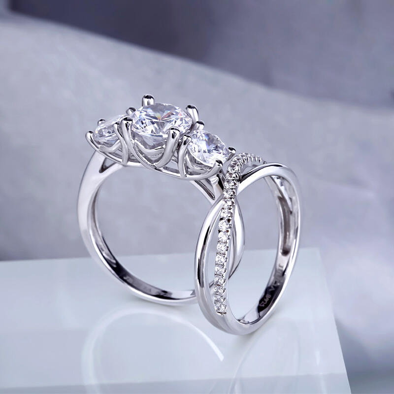 Jeulia Conjunto De Anillos Cruceros Con Tres Piedras De Talla Redonda En Plata De Ley