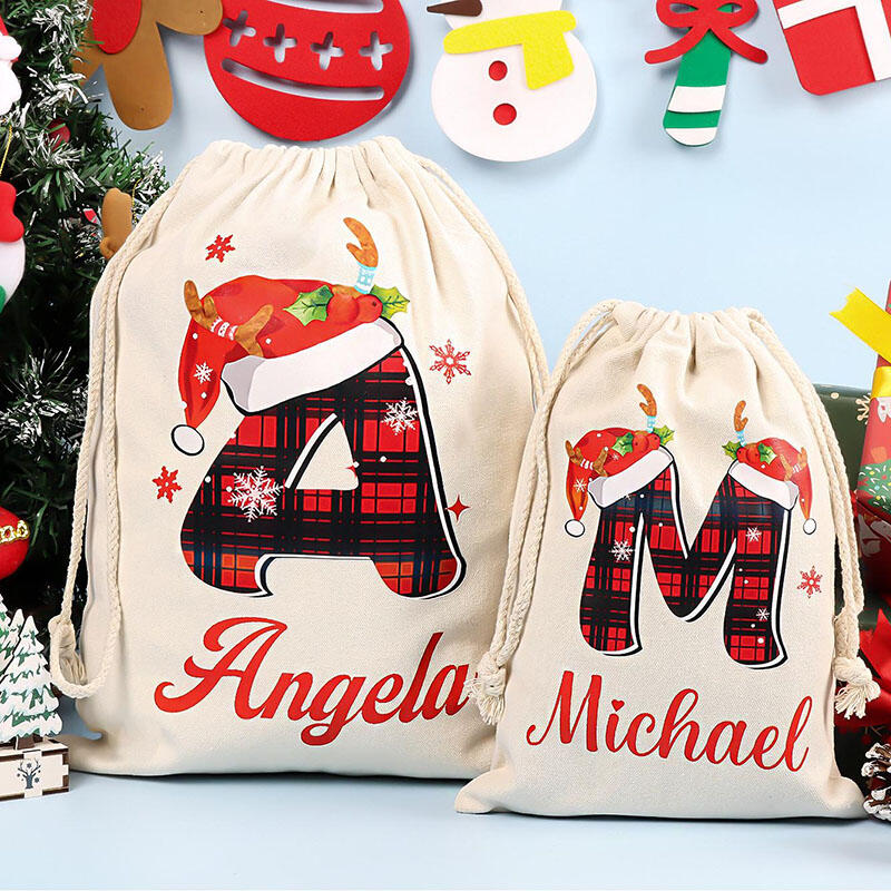 Julklappspåse med personligt namn och valfri bokstav Speciell present till familjen