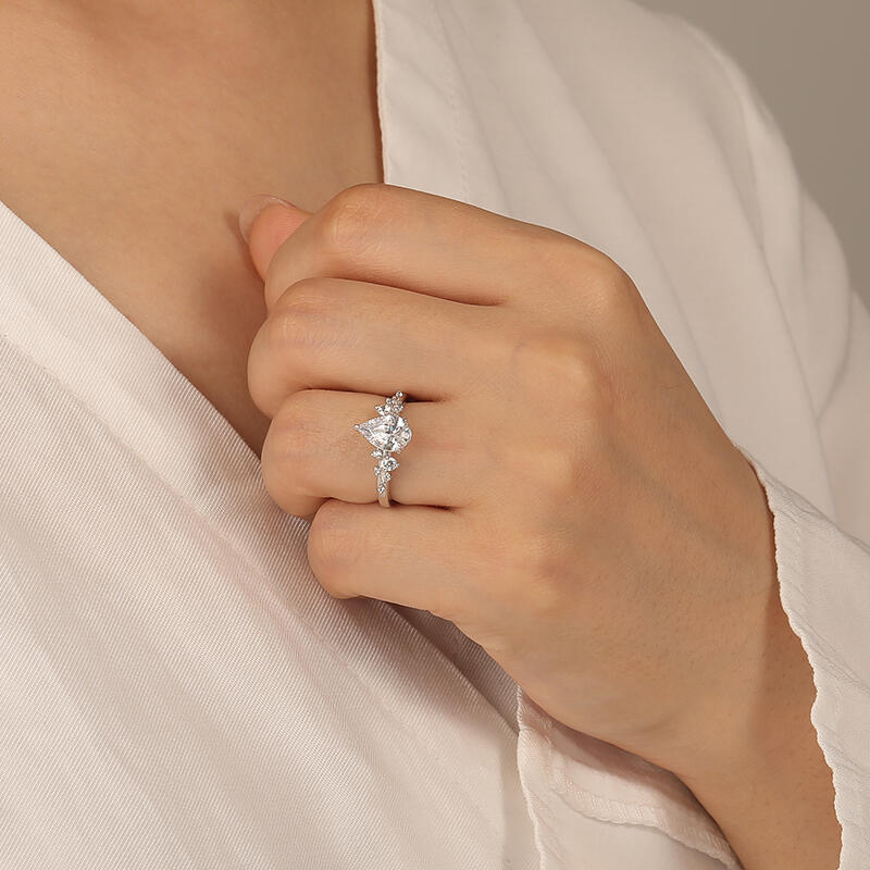 "Can't Help Falling in Love" Pear Cut Cluster Side Stone Engagement Ring