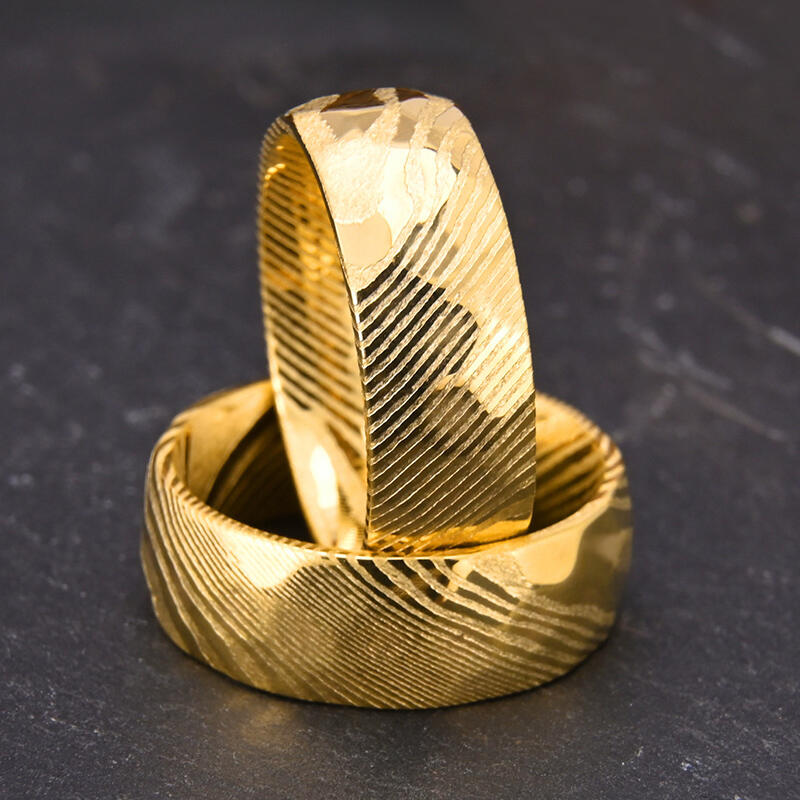 "Sonnenumarmung" 8mm Damaststahl Herren-Ehering