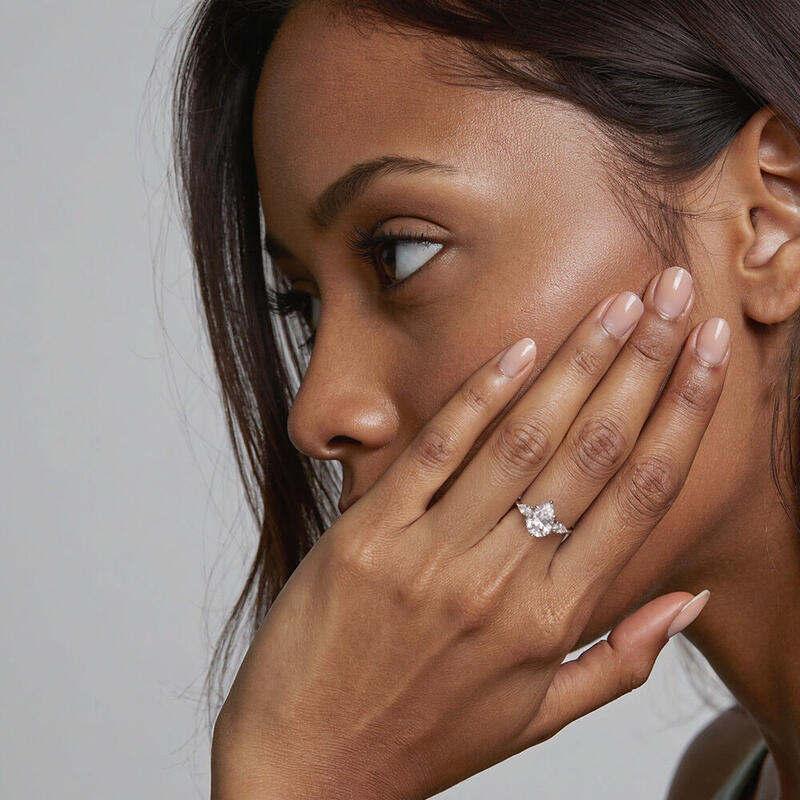 "Never-ending Story" Pear Cut Three Stone Engagement Ring