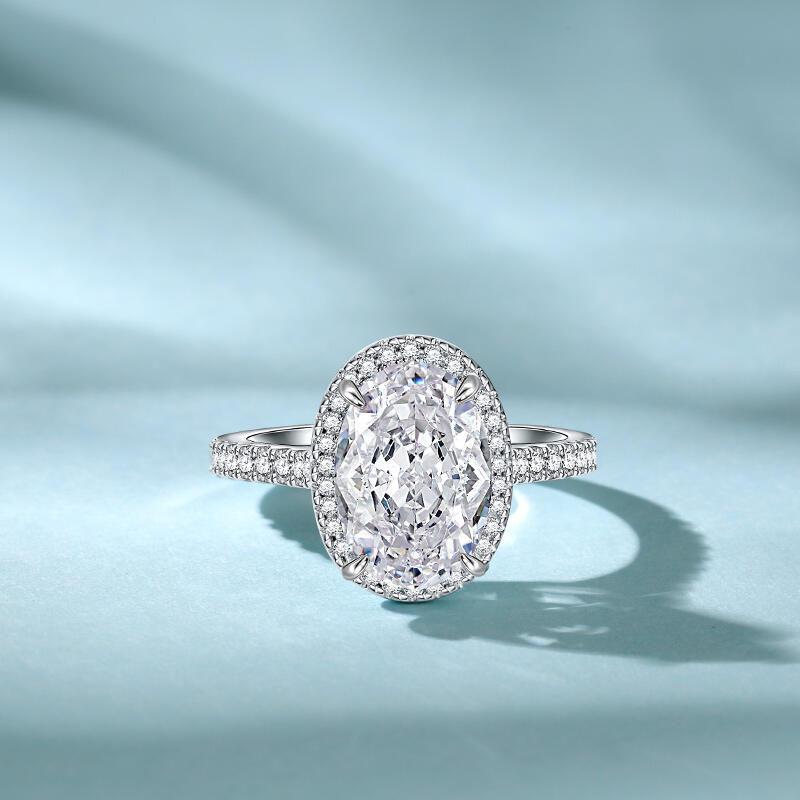 Jeulia Anillo de Compromiso Clásico de Halo Ovalado de Plata