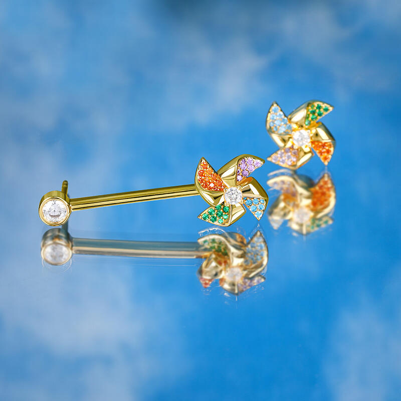 Jeulia Pendientes giratorios asimétricos con colgantes de molinos de colores de plata de ley