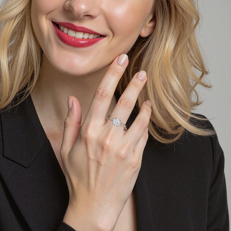 "This Magic Moment" 1.5ct Round Cut Side Stone Engagement Ring