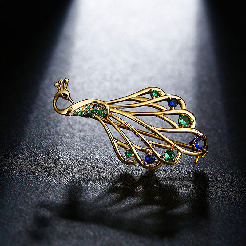 Jeulia Broche con diseño de pavo real de plata de ley