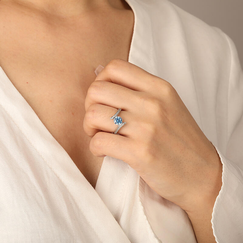 "Into Love River" Round Cut Side Stone Engagement Ring
