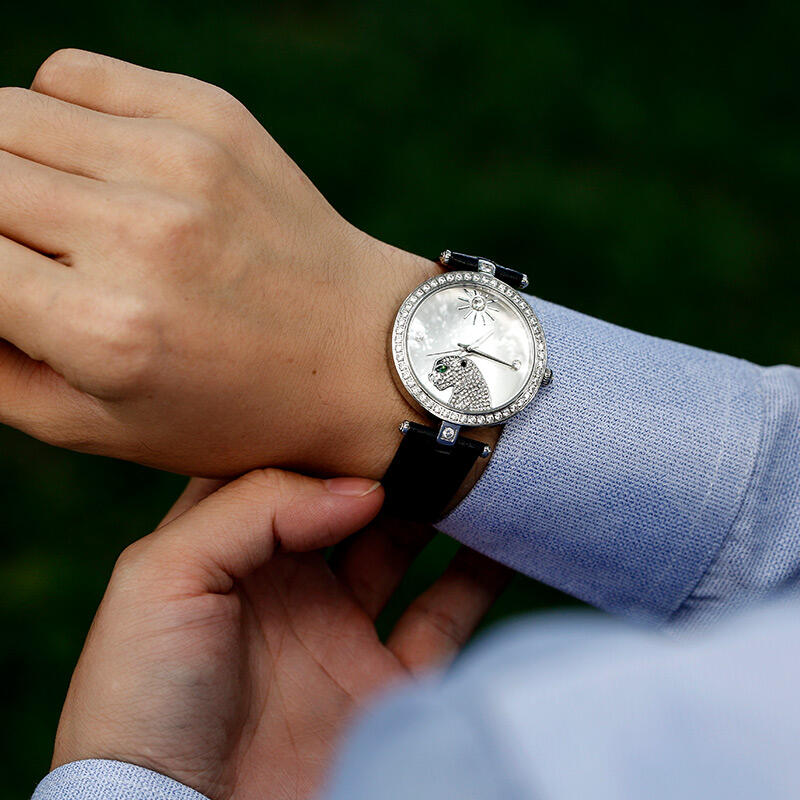 Jeulia "Wild and Free" Leopard Quartz Black Leather Watch with Silver-Tone Dial