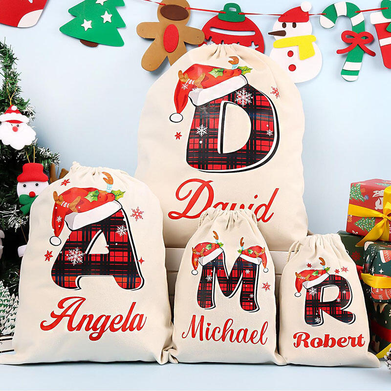 Julklappspåse med personligt namn och valfri bokstav Speciell present till familjen
