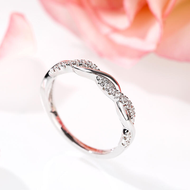 Jeulia Twist Round Cut Sterling Silver Band