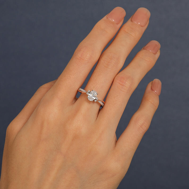 Jeulia Amore Twist Two Tone Oval Cut Engagement Ring