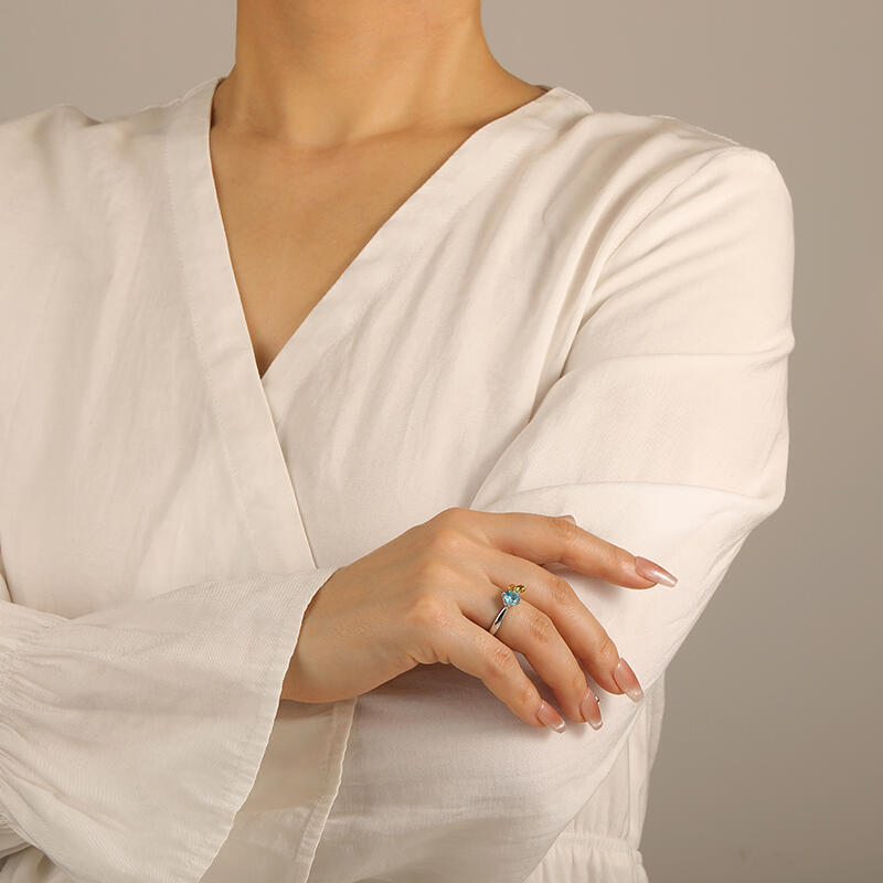 "My Furry Friend" Round Cut Side Stone Engagement Ring