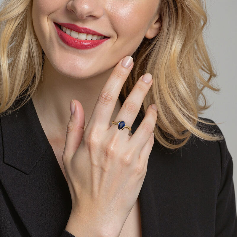 "Love's Eternal Flame" Pear Cut Solitaire Engagement Ring