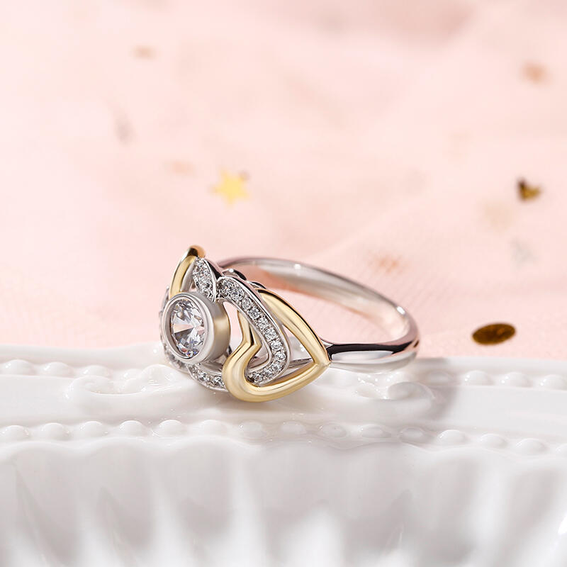 Jeulia "Unstoppable Love" Twist Heart Round Cut Sterling Silver Ring