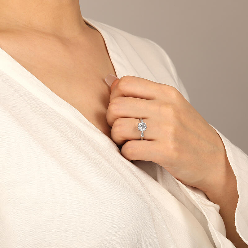 "This Magic Moment" 1.5ct Round Cut Side Stone Engagement Ring