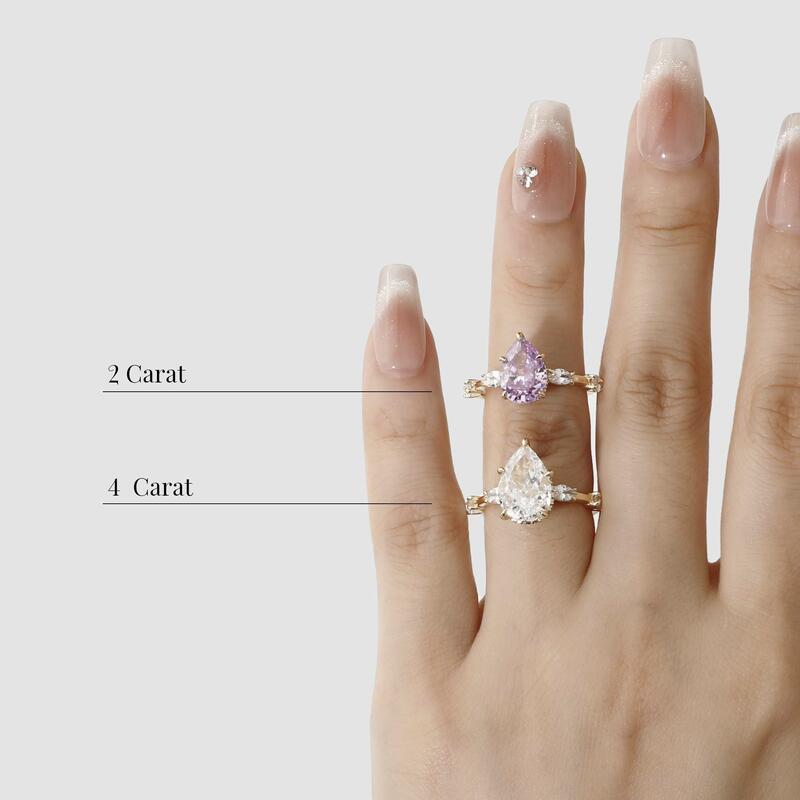 "Love Me Harder" 2ct Pear Cut Side Stone Engagement Ring