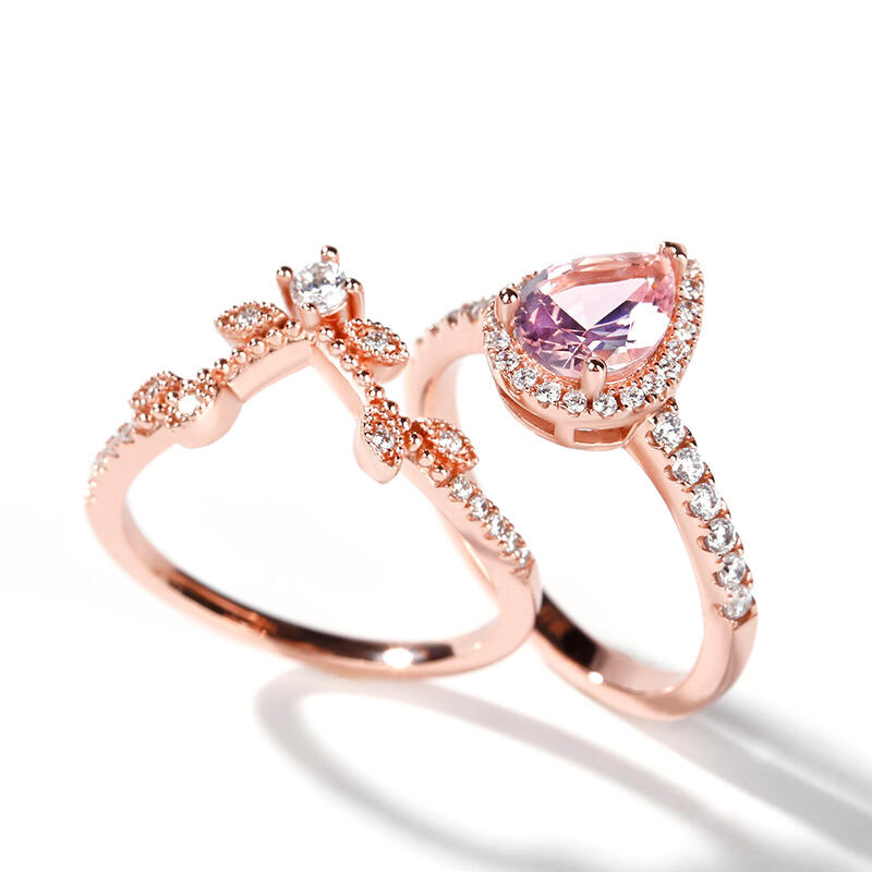 Jeulia Halo Pear Cut Synthetic Morganite Sterling Silver Ring Set