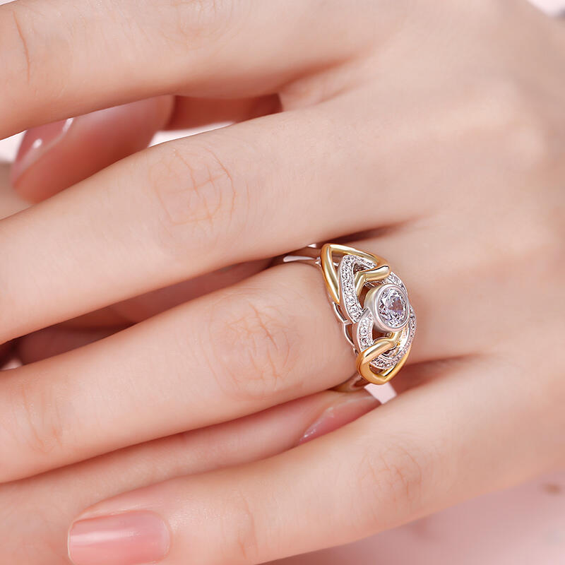 Jeulia "Unstoppable Love" Twist Heart Round Cut Sterling Silver Ring