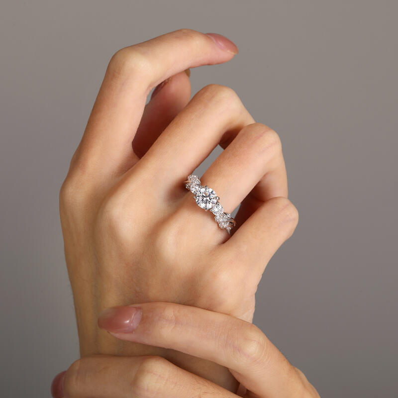 Jeulia Round Three-Stone Leaf Engagement Ring