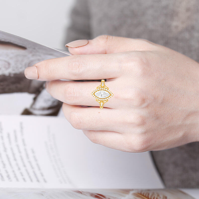 "A Thousand Golden Days" Marquise Cut Halo Engagement Ring