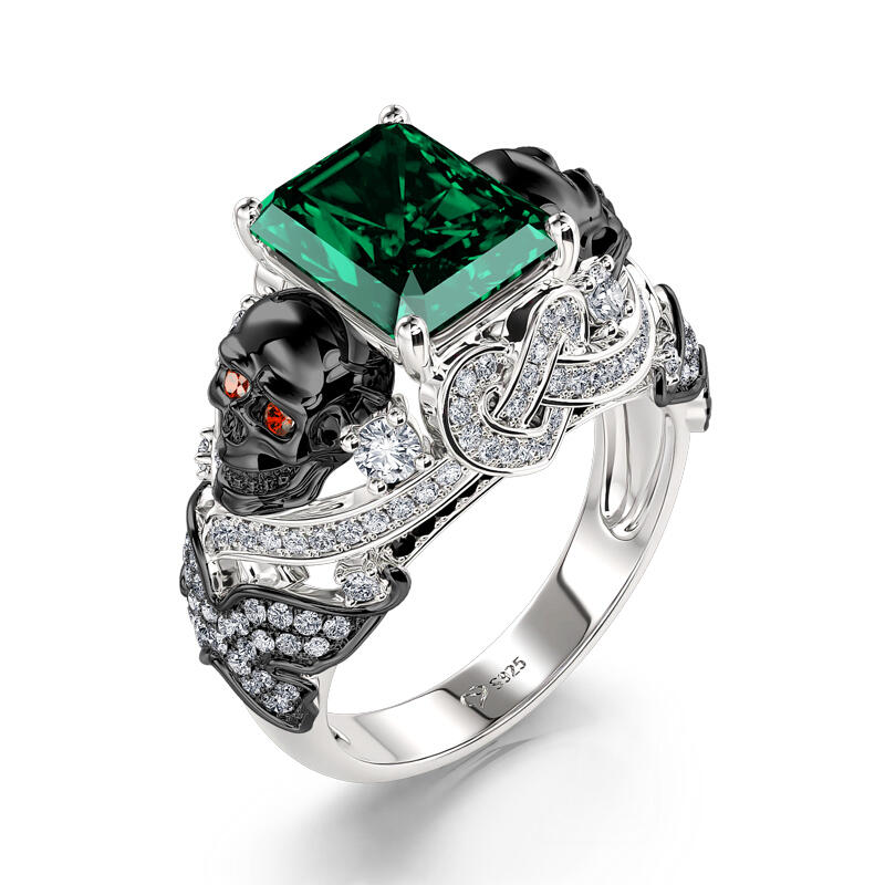 Jeulia Anillo de Plata de Ley Diseño Calavera y Mariposa con Corte Esmeralda
