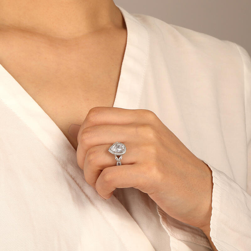 "Love Does Not Fade" Pear Cut Halo Engagement Ring