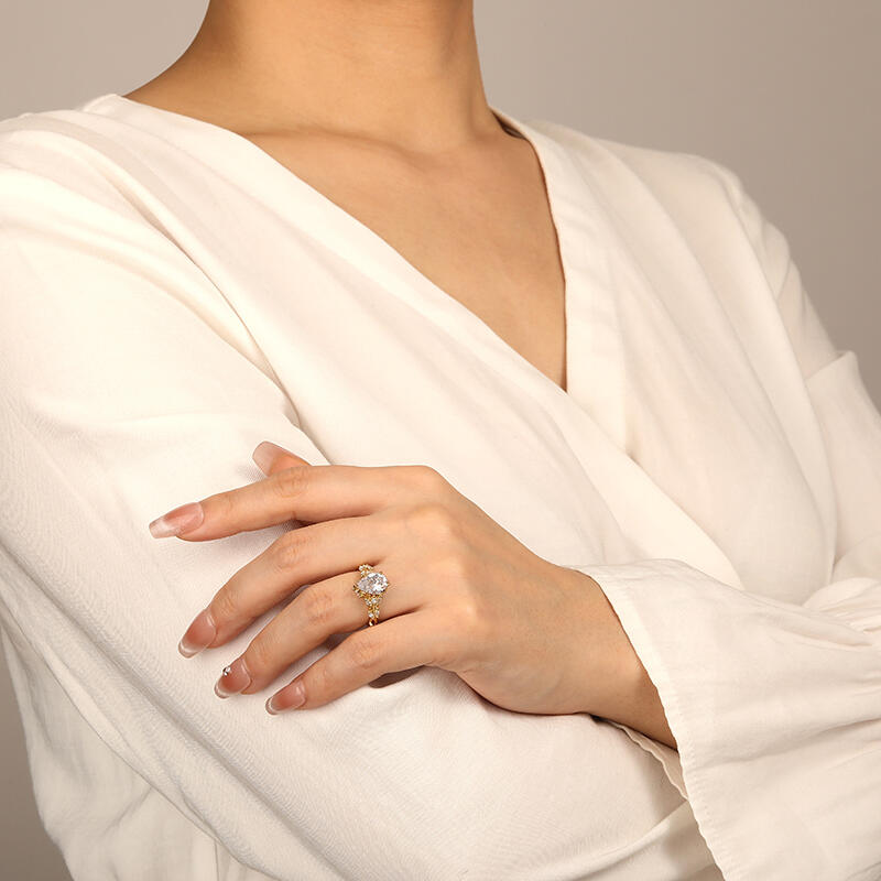 "Whisper Of Flowers" Pear Cut Side Stone Engagement Ring